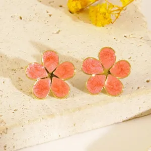 Vintage stainless steel pink enamel flower stud earrings, elegant floral jewelry for women.