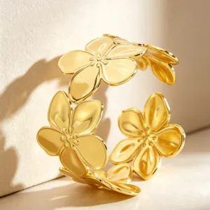Gold stainless steel floral open cuff bracelet, chic fashion jewelry for women and girls.