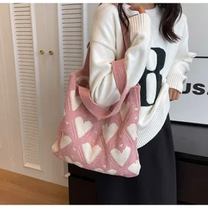 Pink heart knit shoulder bag detail, soft fabric, large capacity casual tote for daily wear.