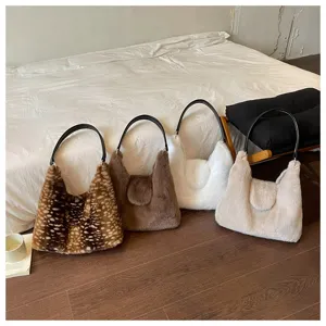 Plush shoulder bag detail showing soft fluffy texture and color variants for autumn winter.