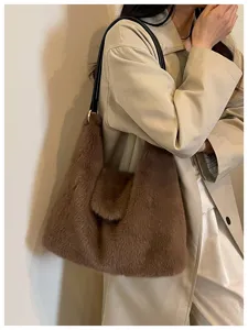Brown plush shoulder bag for women, trendy fuzzy tote bag with strap for autumn winter.