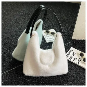 Fluffy plush shoulder bag for women, soft faux fur hobo tote handbag, cozy winter fashion purse.