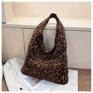 Detailed view of a stylish leopard print shoulder tote bag, retro large capacity design.