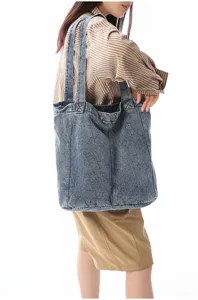Casual large capacity washed denim tote bag for women, retro commuter shoulder handbag.