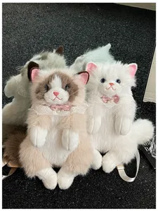 Cute simulation cat plush backpack detail, featuring soft faux fur and delicate lace collar.
