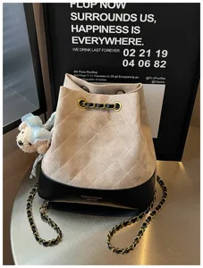 Women fashion quilted bucket bag PU leather shoulder crossbody bag with chain strap.