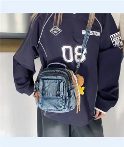Denim crossbody shoulder bag for women, retro multi-pocket casual cute daily purse with strap.