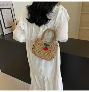 Woven straw handbag for women, sweet pastoral style with cherry decor and pearl shoulder strap.