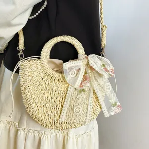 Bolso cruzado de paja tejido estilo pastoral con lazo de encaje para vacaciones en la playa
