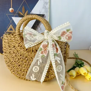 Bolso de paja de estilo pastoral con gran lazo de encaje floral, elegante bolso de playa.