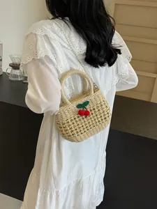 Pastoral style woven straw handbag for women, hollow beach shoulder bag with cherry.