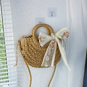 Bolso de mano de paja trenzada para mujer, bolso cruzado de playa de verano con lazo.