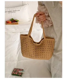 Sac cabas d'été ajouré en paille tissée pour femme, grand sac à épaule de plage élégant.