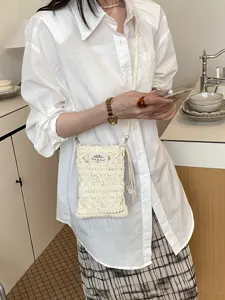 Sac bandoulière de téléphone au crochet bohème pour femmes, élégant sac tricoté chic.