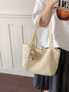 Sac cabas en crochet beige pour femme, élégant sac d'épaule ajouré pour les vacances.