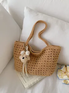 Sac à bandoulière en tricot ajouré chic pour femme, grand cabas de plage d'été.