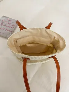 Grand sac cabas tressé en paille avec poignées en cuir marron, sac de plage d'été décontracté.