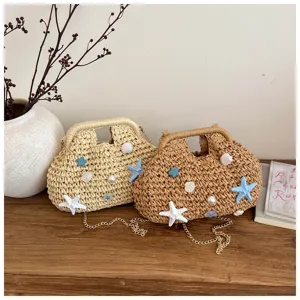 Borsa in paglia intrecciata con conchiglie stelle marine, elegante borsa da mare donna.