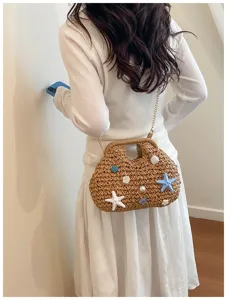 Borsa a tracolla in paglia intrecciata stile mare da donna, con conchiglie e perle.