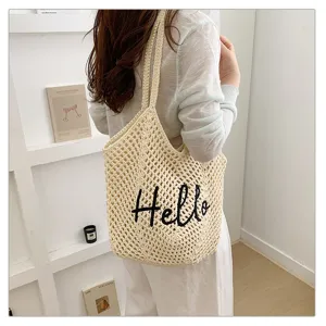Beigefarbene Baumwoll-Häkel-Umhängetasche mit schwarzer Hello-Stickerei, lässige Strandtasche