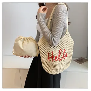 Häkelnetz Umhängetasche für Damen, lässige Strandtasche mit Innentasche und süßer Stickerei.