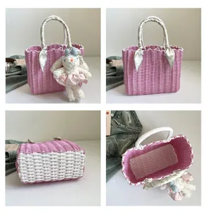 Details of pink woven handbag with bunny pendant, summer beach cute straw basket bag.