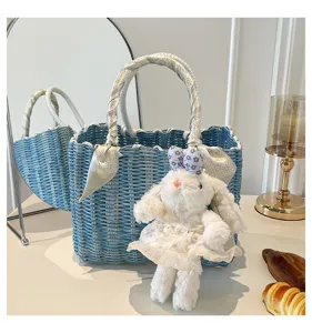 Blue woven handbag with cute bunny charm, summer casual tote bag for women and girls.
