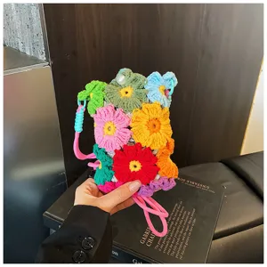 Bunte handgefertigte Häkelblume Mini Umhängetasche, süße gestrickte Regenbogen Handytasche.