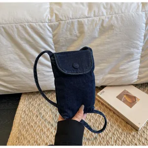 Mini denim crossbody phone bag, casual retro shoulder purse with flap and strap detail.