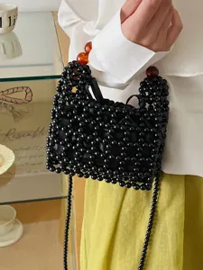 Chic bolso bandolera mini de cuentas negras con elegantes cuentas de ámbar para el uso diario.