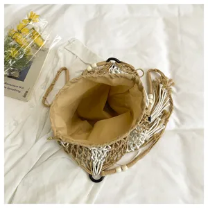 Boho cotton macrame fringe shoulder bag detail, hollow beach bucket bag with inner pocket.