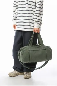 Donkergroene canvas reistas met grote capaciteit, casual sporttas voor reizen en dagelijks.