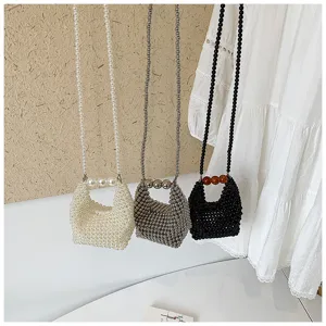 Mini pearl beaded crossbody bag stylish summer cute handbag detail showing elegant design.