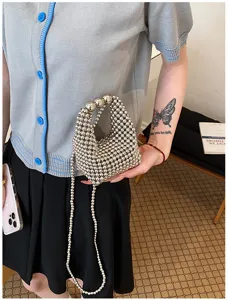 Charming metallic beaded mini handbag detail, silver mini beaded crossbody bag for women.