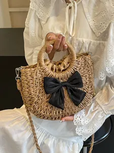 Bolso de mano de paja elegante con lazo negro, bolso cruzado dulce para mujer playa.