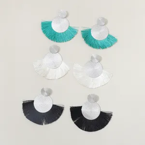 Bohemian fan tassel earrings detail, elegant silver metal disc with colorful thread drops.