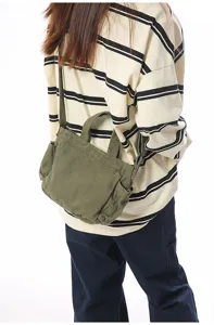 Green canvas crossbody bag, casual tote shoulder bag for women, lightweight commuting style.