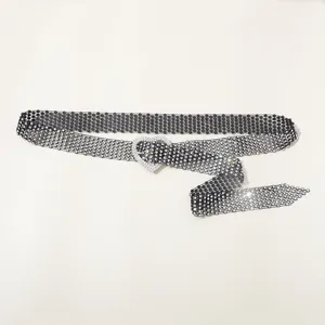 Detailed close-up view of a sparkling rhinestone mesh belt featuring a chic heart buckle accessory.