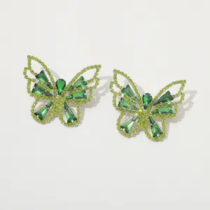 Exquisite green rhinestone butterfly earrings, retro claw chain hollow jewelry style.
