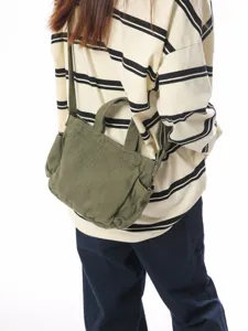 Vintage canvas crossbody shoulder bag for women, large capacity casual tote for daily commute.