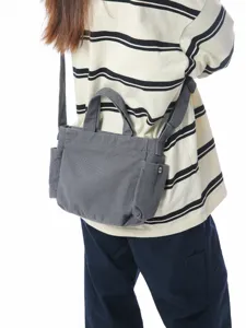 Retro canvas crossbody bag for women, large capacity casual shoulder bag with side pockets.