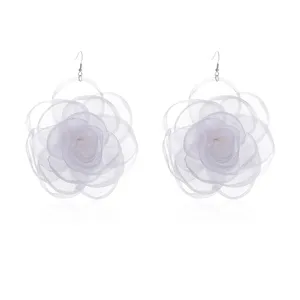 Detailed view of elegant white sheer chiffon flower drop earrings, vintage floral design.