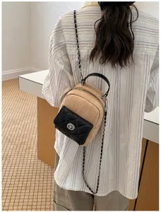 Stylish straw mini backpack for women, cute quilted chain shoulder bag for travel daily.