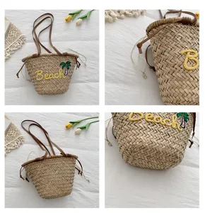 Sac seau en paille tressée avec broderie Beach lanières en cuir marron sac bandoulière plage