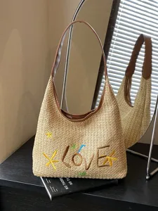 Borsa a tracolla intrecciata da spiaggia estiva da donna, grande borsa di paglia ricamata.