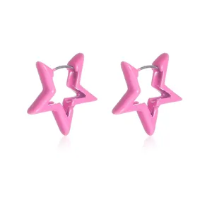 Detail view of pink star huggie earrings, minimalist geometric hollow metal design closeup.