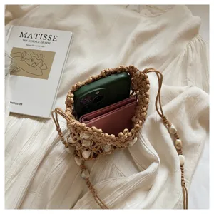 Bohemian woven crossbody phone bag with beads, ideal for vacation beach style and daily use.