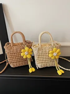 Stro geweven handtas met zonnebloem bedel, casual emmertas voor vrouwen, schoudertas crossbody.