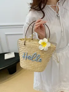 Woven straw handbag for women, summer beach vacation tote bag with cute hello letter design.