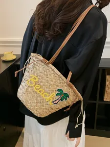 Sac bandoulière en paille tissée pour femme, grand cabas de plage avec jolie broderie.